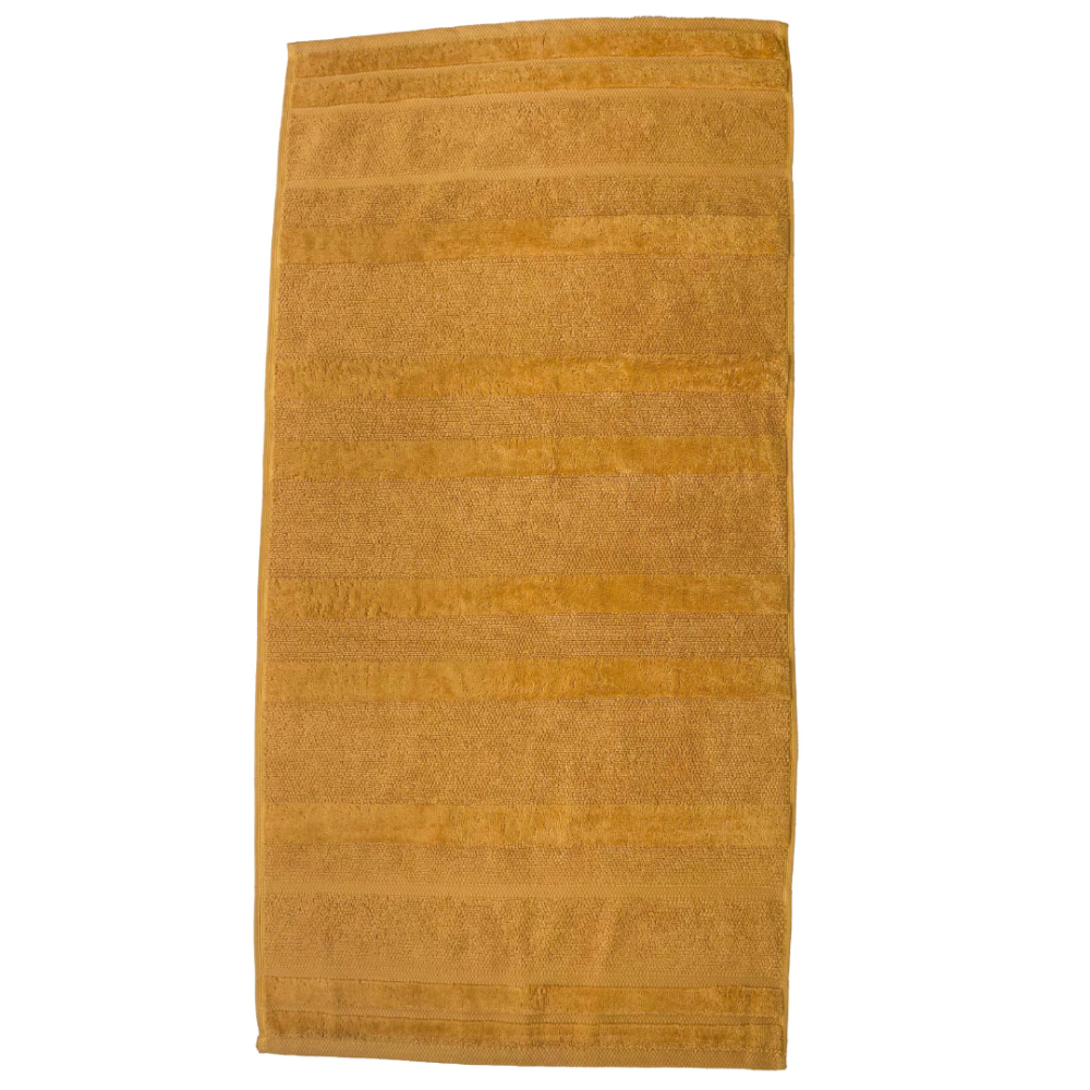 Ręcznik łazienkowy „Terry Mustard“. Ręczniki, 50x90 cm, 70x140 cm. Elegancki musztardowy bawełniany ręcznik kąpielowy, łączący miękkość i wysoką chłonność, idealny do żywego i wyrafinowanego wyglądu łazienki